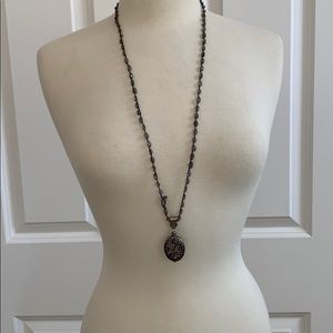 Love Heals hand-made silver locket necklace